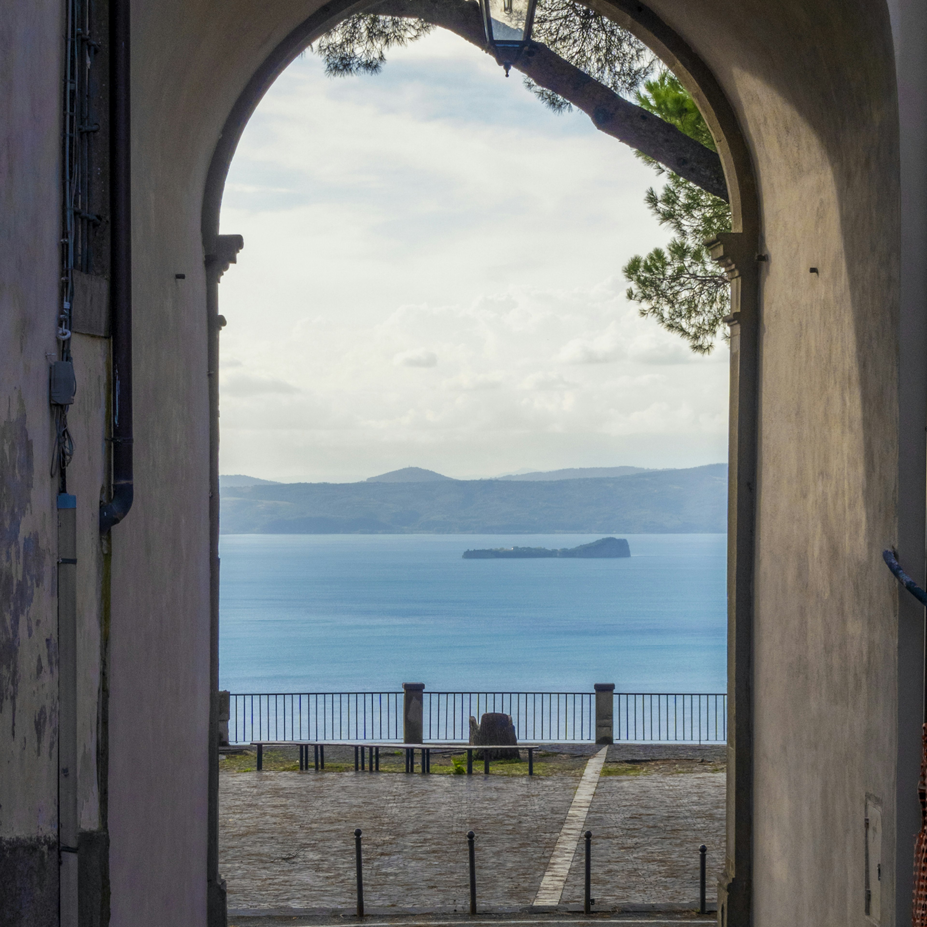 Lake Bolsena, seen through city gate of Montefiascone