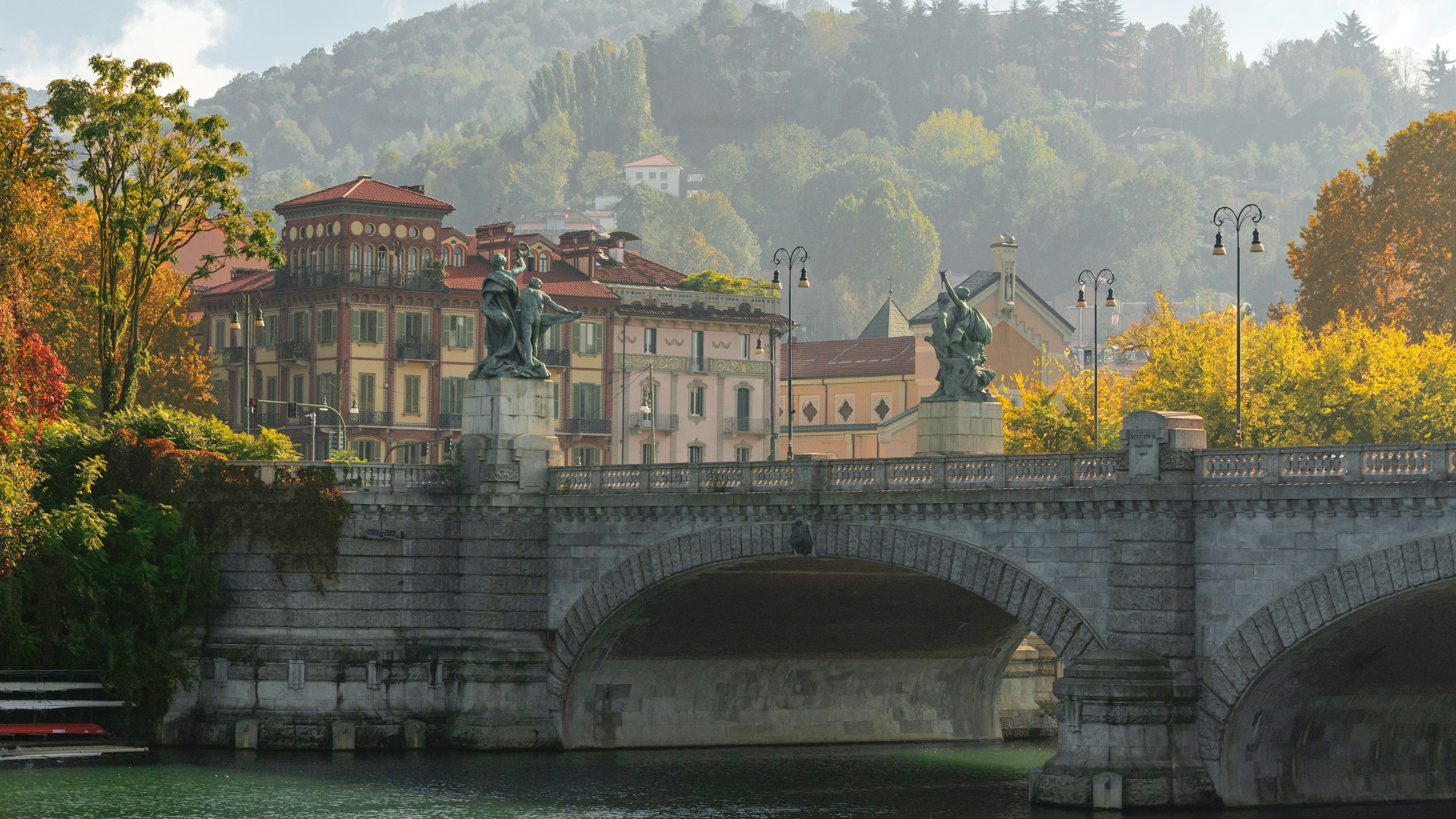 Umberto I bridge, Turin, Piemont, Italy. View of the autumn hills of the west side of the Po river in Turin; Shutterstock ID 2400633659; purchase_order:65050 - Digital Destinations and Articles; job:Online editorial; client:Weekends in Italy; other:Ann Douglas Lott2400633659