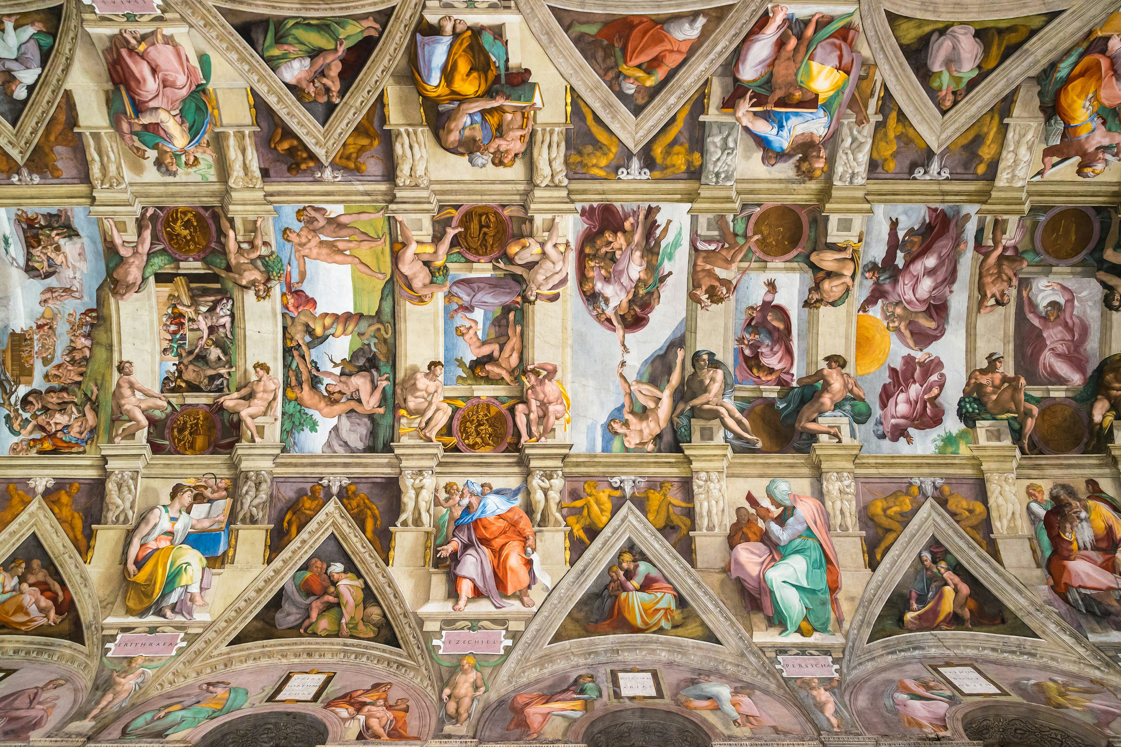 A ceiling in a chapel with intricate paintings depicting the relationship between humans and God